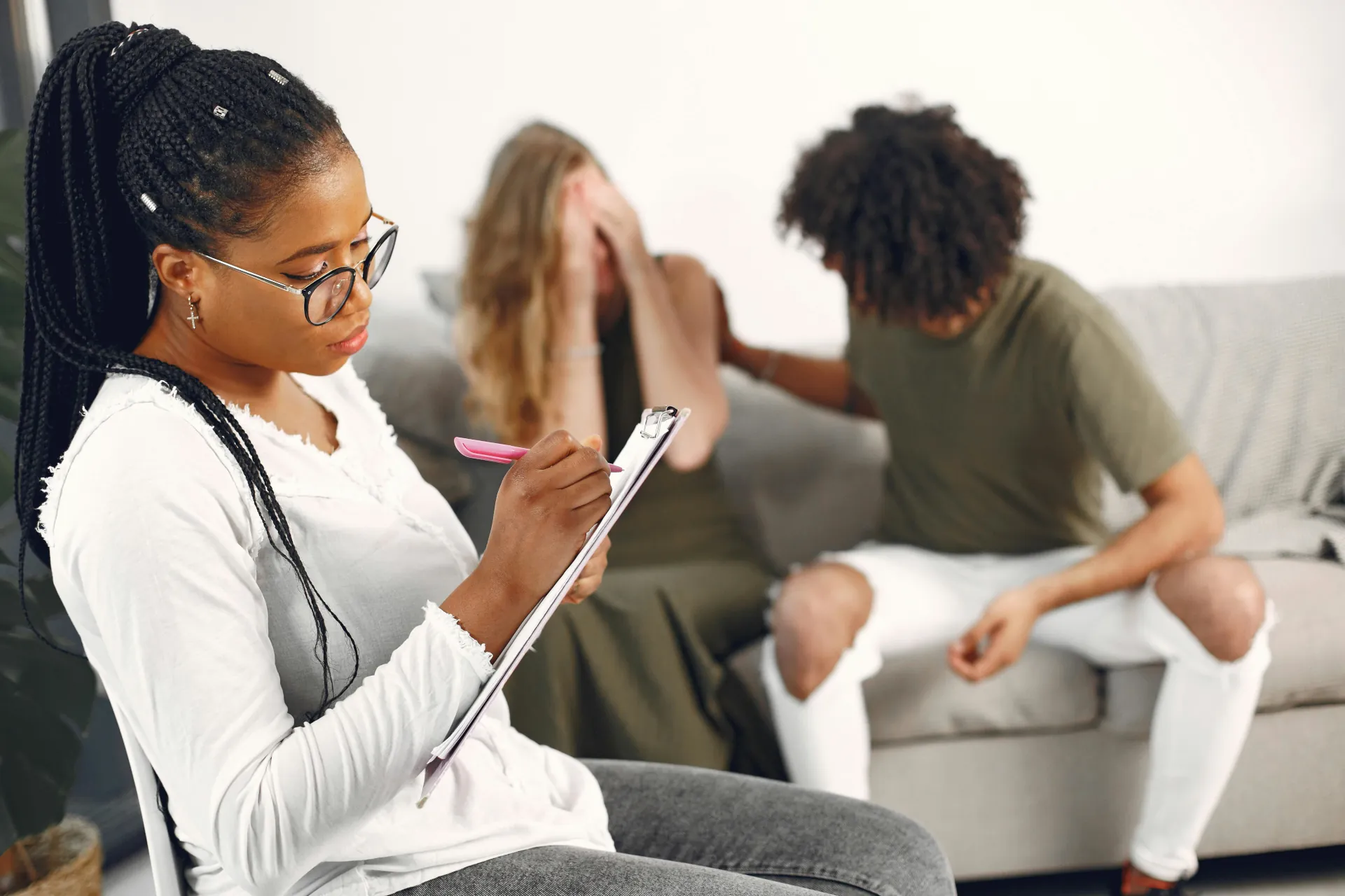 Cognitive Behavioural Therapy is being used by this therapist to understand the issues that a young couple are experiencing.